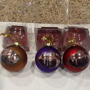 Kurt S. Adler
 3 Downton Abbey glass ornaments. 
Gold purple and red